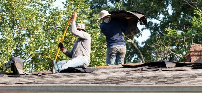 contractors show how to remove shingles with shingle shovels
